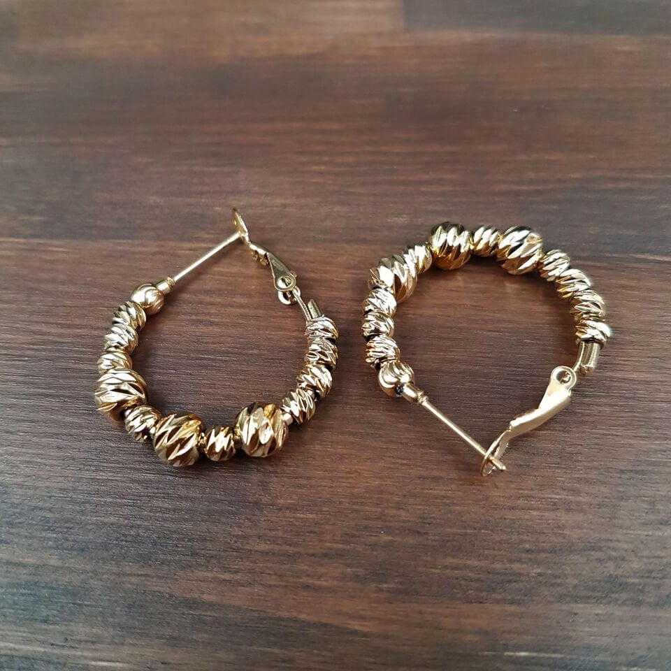 Gold Renk İşlemeli Halka Çelik Küpe